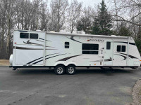2010 travel trailer with outside kitchen and bunkhouse