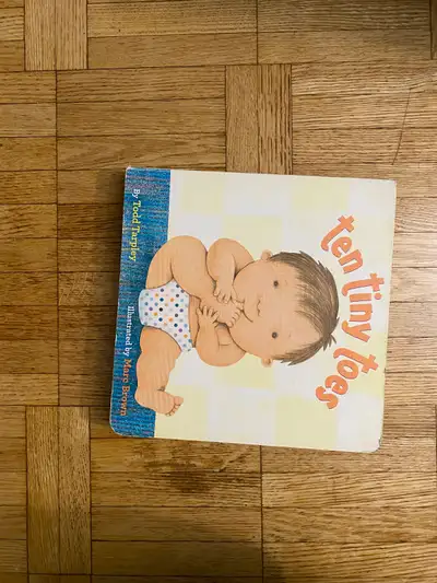 Ten tiny toes board book, View more