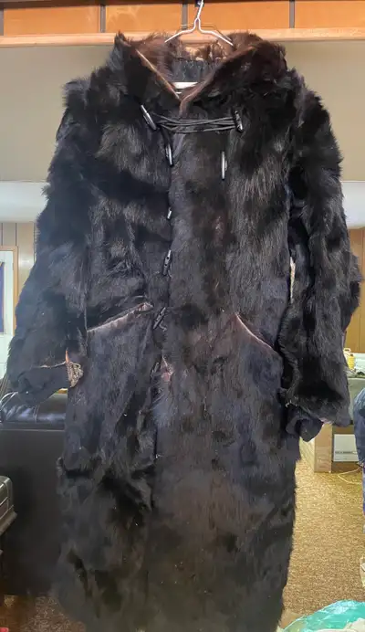 Vintage black bear fur stagecoach coat; (circa late 19thC); Exterior black bear fur & warm cotton in...