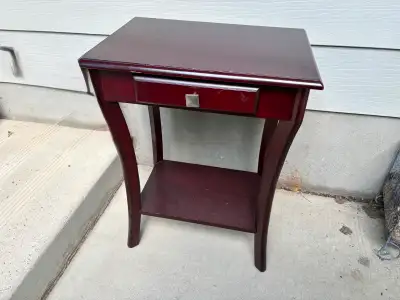 Small side table with drawer . 24" high x 18"wide x 12" deep . Good condition . Smoke free home . $1...