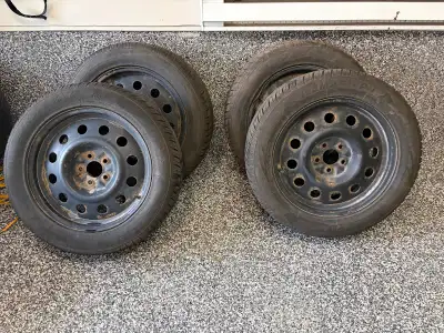 235/55/18 Winter tires on rims ready for installation. Only used half a winter so like new For quick...
