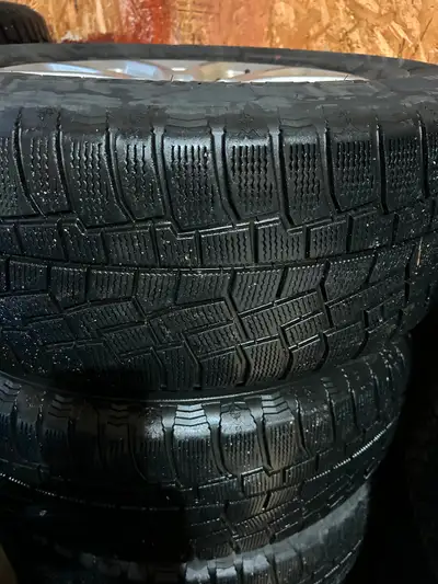 selling a full set of oem rims with cooper winter tires in exclent condition with sensors from a jee...