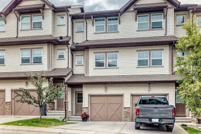 WALK-OUT TOWNHOME | 2 BEDS | 2.5 BATHS | ATTACHED GARAGE | Welcome to this immaculately maintained,...