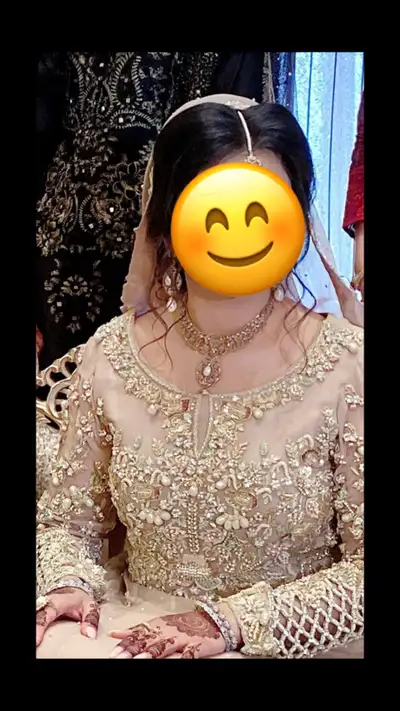 This stunning, wedding dress features intricate detailing and embellishments, perfect for your speci...