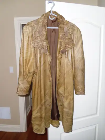 1. Long leather coat. Beautiful rich brown color. Antelope brand. Made in Greece. Size S/M One of a...