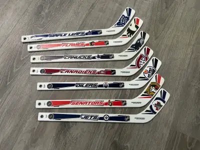 All 7 Canadian NHL hockey mini sticks, View more