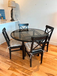 BRAND NEW glass top table and 4 dining chairs