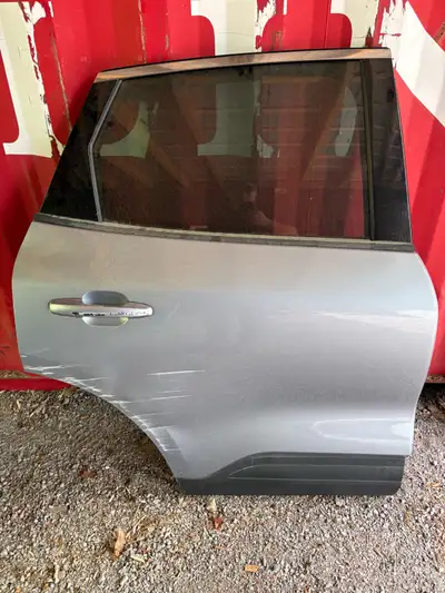 Rear passenger door, damaged skin. Door is fully intact , good window, switch, motor etc and door ha...