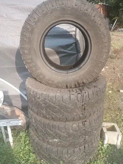 These Goodyear Wrangler Duratrac tires, size 35x12.50R17LT, are ready to tackle any terrain with the...