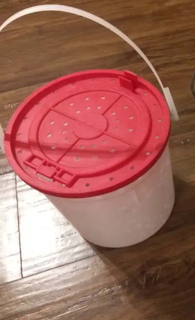 Some bait buckets and a fish basket.