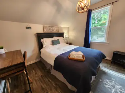 Your cozy, bright and cheerful private retreat after a day of work awaits on the 2nd floor of this q...