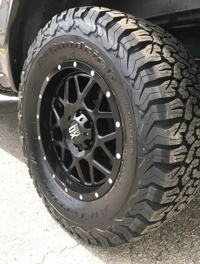 Ford F-150 XD Grenade wheels wrapped in BFG KO2 AT tires. Lots of tread on tires, not used in winter...