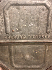 Antique movie reel case marked Columbia Pictures