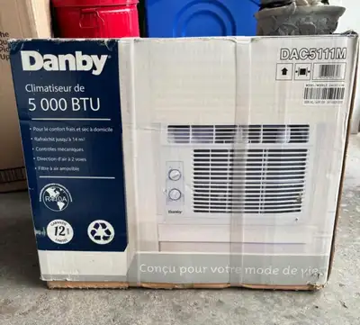 New Danby window air conditioner has 5,000 BTU cooling capacity. Unit features mechanical controls a...