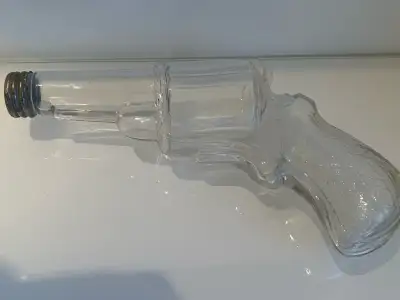 VINTAGE ANTIQUE CLEAR GLASS GUN / PISTOL CANDY CONTAINER BOTTLE