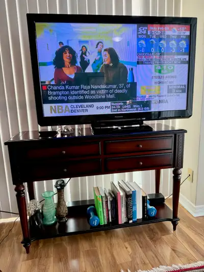Panasonic TV and Cabinet, View more