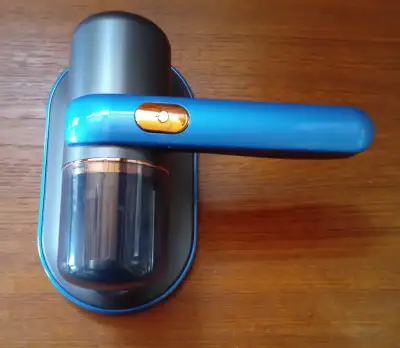 Handheld vacuum cleaner, rechargeable, great for beds, sofas, cars. Used very little, like new, $25,...