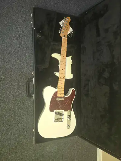 This guitar has been modified/bastardized a fair bit. Body has a pearl white automotive paint, has '...