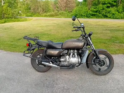 1978 Black Honda Gold Wing GL1000, in excellent condition, comes with box of new and used parts, new...