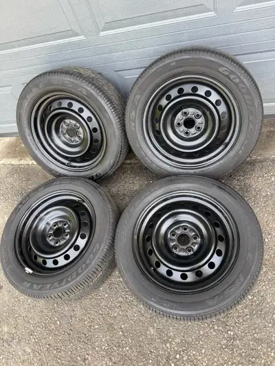 Goodyear tires are like new. All hold air, no bends, no cracks, no tire plugs. Original toyota rims...