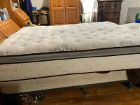 Queen size bed with pillow top mattress