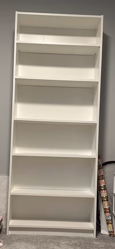 IKEA Billy bookcase in excellent like new condition. Owned for less than a year. Never moved. See fr...