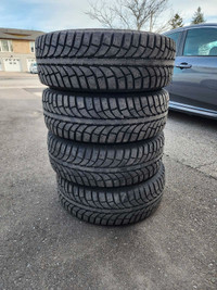 225/65/16 Winter tires on rims.