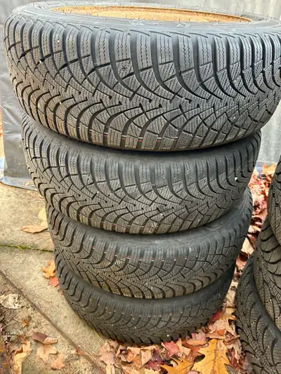 4 Goodyear winter tires 205/55/R16 one season 5K on them with rims Rims need paint and bolt pattern...
