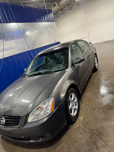 Altima 2.5L motor replaced awhile back roughly 200k on it, good winter tires,new battery/brakes done...