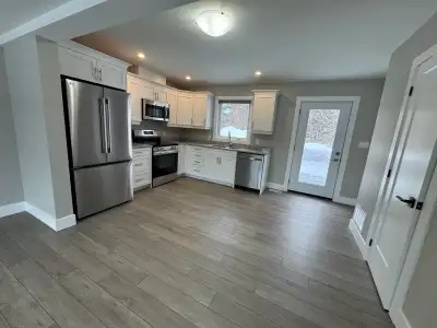 Newly built 2 bedrm 1.5 bathrm two story unit in a three unit building. The apt comes with fridge, s...