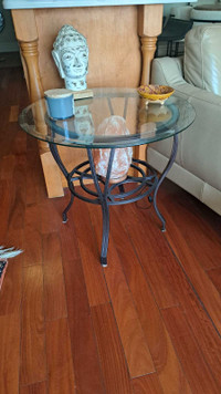 2 wrought-iron and glass end tables.