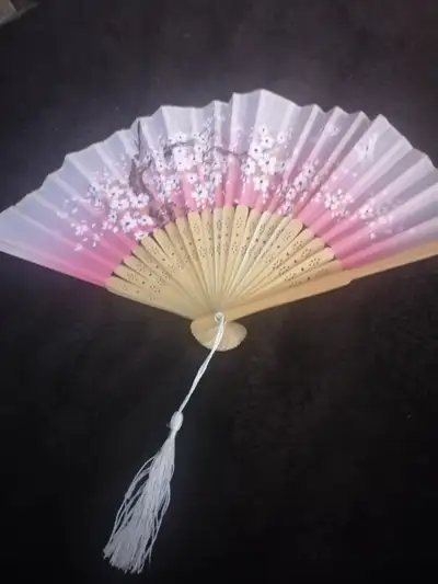 Decorative pink fan, View more