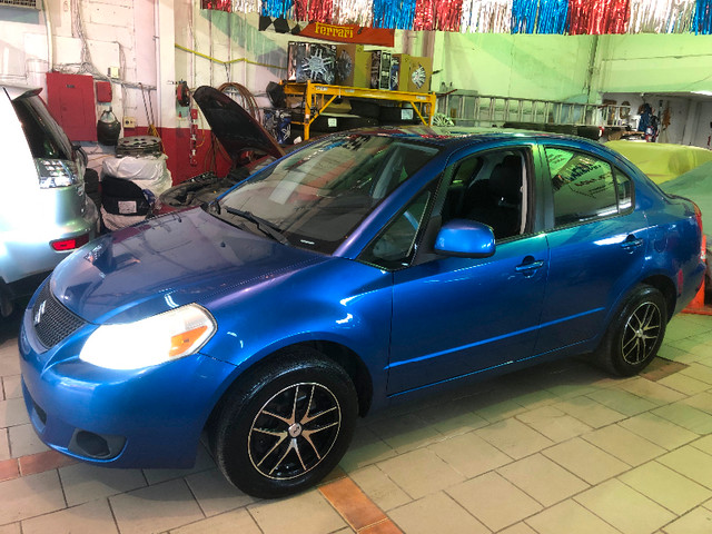 2012 SUZUKI SX4 LE/ BAS KM’s/ COMME NEUF/ TRÈS BONNE MÉCANIQUE dans Autos et camions  à Ville de Montréal