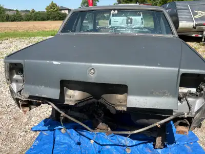 Rot free oem gm steel gp trunk lid, door glass, solid rad cradle support, front fiberglass header pa...