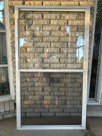 White aluminum windows for sale. All are single hung, slide up with single glass pane. All are in gr...
