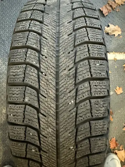Set of 4 winter tires and rims, Michelin X-Ice 195-65R15. Tires were used on a 2003 Toyota Corolla,...
