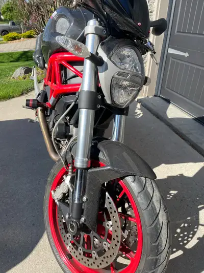 2009 Ducati Monster 1100. 30560 km Mint shape with lots of aftermarket. Powder coated rims, termigon...