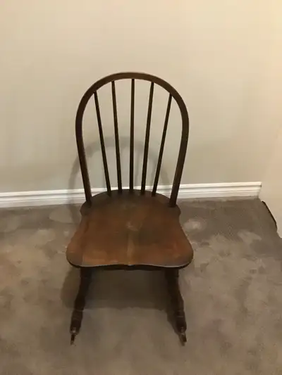Small wooden Antique rocking chair., View more