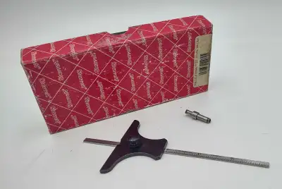 L.S. Starrett no.237 depth gauge with 6" no.610N ruler. Comes in original box! https://www.avenuesho...