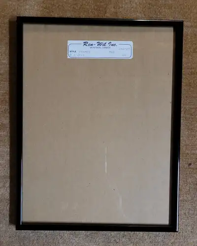 A classic 8" x 10" photo frame with a black metal border. Full frame size is 11" x 9" and 3/4" thick...