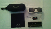 Ladies and mens Oakley Sun Glasses with cases ect...