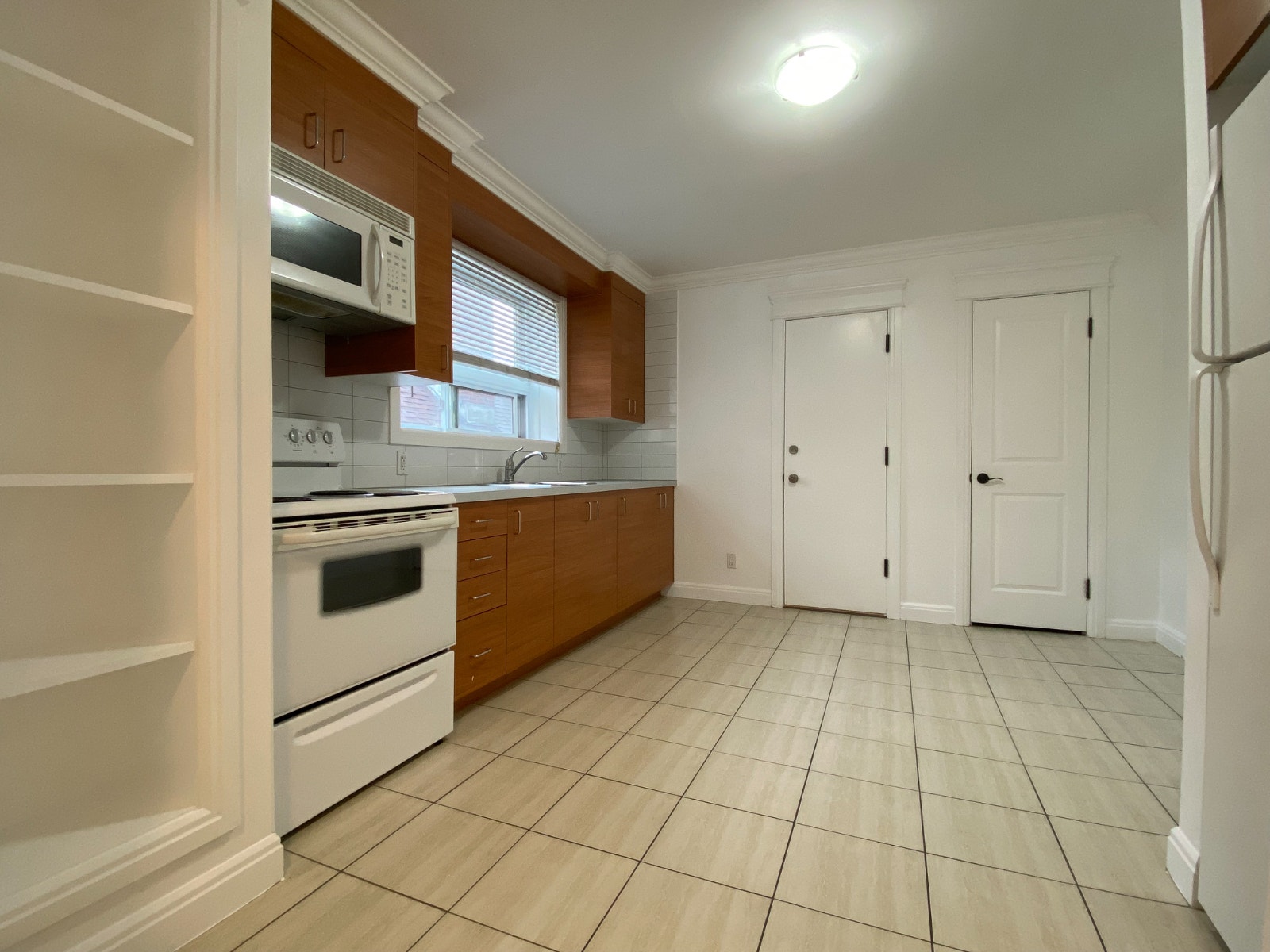 3 1/2 STYLE CONDO SITUER A PARC EXTENSION (CHAUFFER) — photo 1