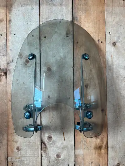 Harley windshield. Was on a 2009 “Rocker” softail. May fit other bikes.