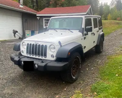 Selling 2014 Jeep Wrangler Unlimited Low KM - 145000 Asking $15000 Located North of North Bay in Tem...