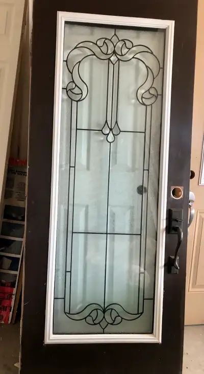 Exterior Metal door with double pane security lead iron bar glass insert 33.5”x79”in good condition...