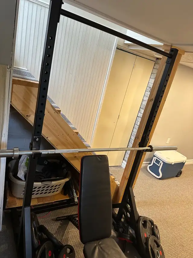 Squat rack and bar comes with bench and 275lbs in plate weights 63417655569153123