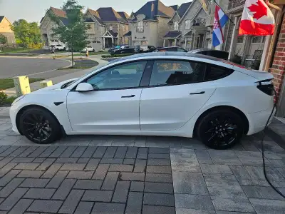 2023 model 3 Tesla long range. Brand new tires and rims installed last week. Car still carries warra...