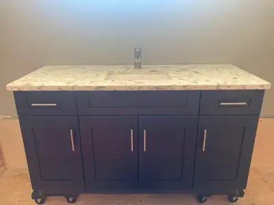 Brand new 56” wide bathroom vanity (finished on both ends) from kitchen and light gallery. Never use...