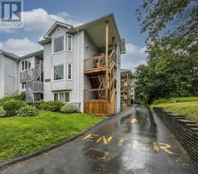 Townhouse style condo, top floor corner unit quiet beautiful view 1,058 SqFt two-bedroom two-bathroo...
