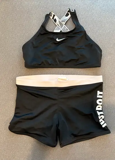 Check out this never worn Nike athletic set, perfect for your active kiddo! This set includes a styl...